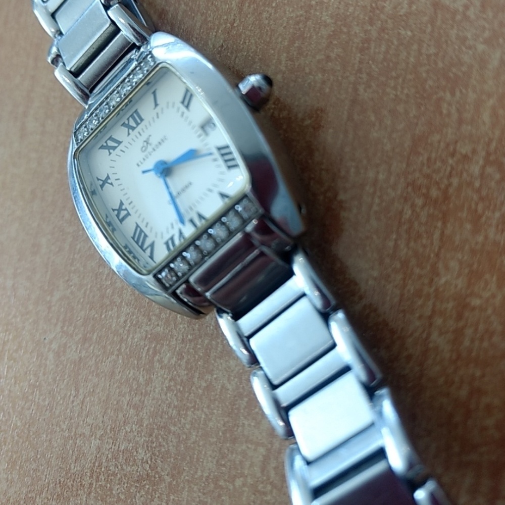 Diamond tank style watch